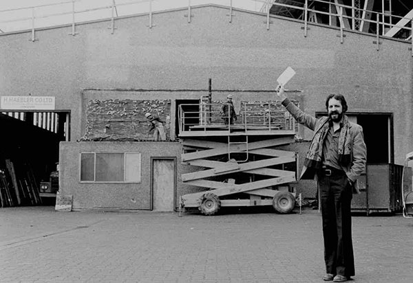 Bill Millerd with a cheque for the construction of the Granville Island Theatre