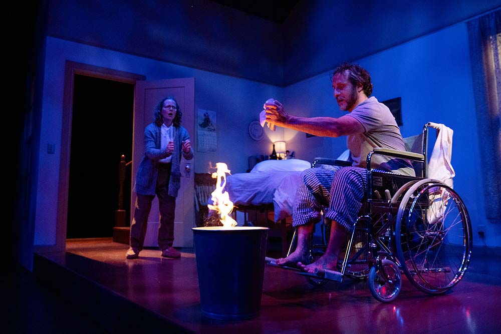 Misery, adapted by William Goldman from the Stephen King novel (Sept 10 - Oct 14, 2022 at Vertigo Theatre). Actors Anna Cummer and Haysam Kadri. Photo by Tim Nguyen.